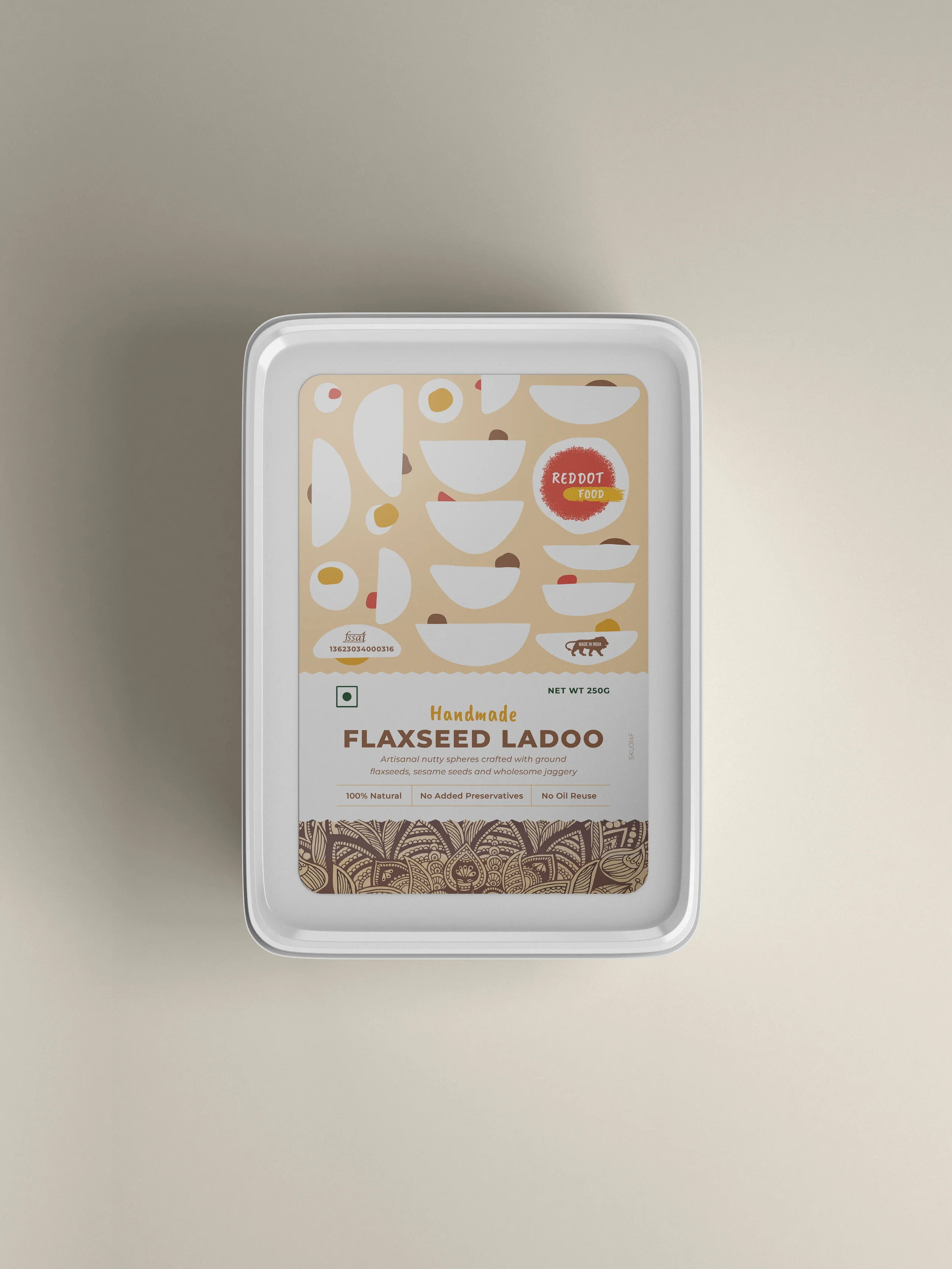 A packet of Flaxseed Ladoo, featuring its packaging with branding and description, emphasizing the artisanal and healthy qualities of the sweet.