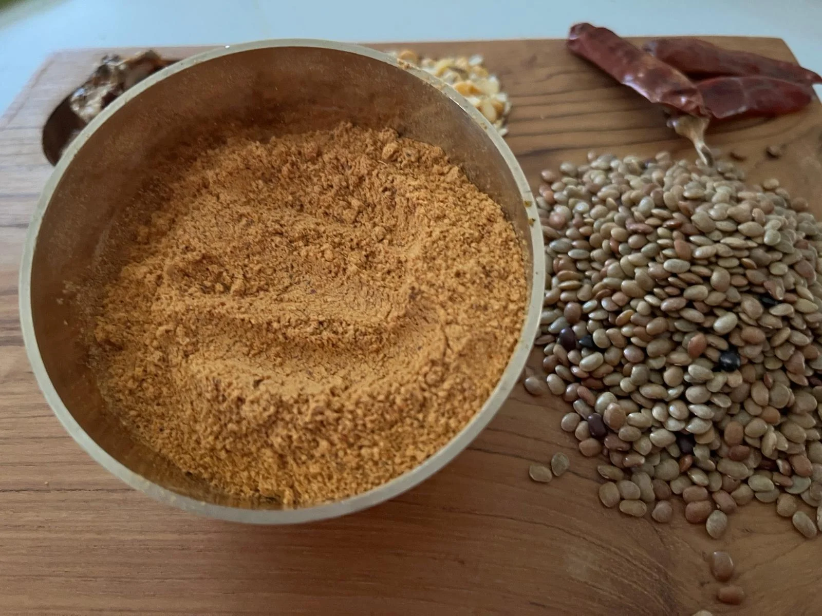 A close-up of Horse Gram Podi, a wholesome and flavorful Indian spice blend by Reddot Food, made with roasted horse gram and aromatic spices, perfect for pairing with rice and other dishes.