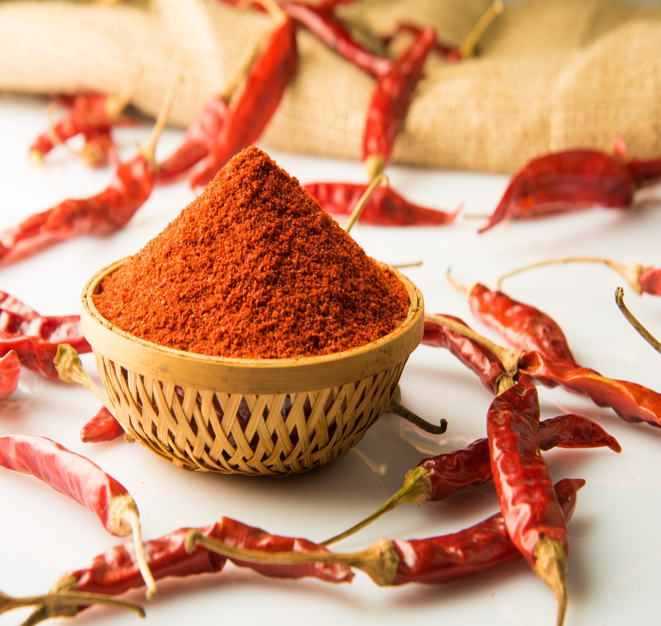 Bright red chilli powder, known for its bold heat and flavor, used in a variety of Indian dishes and spice mixes.