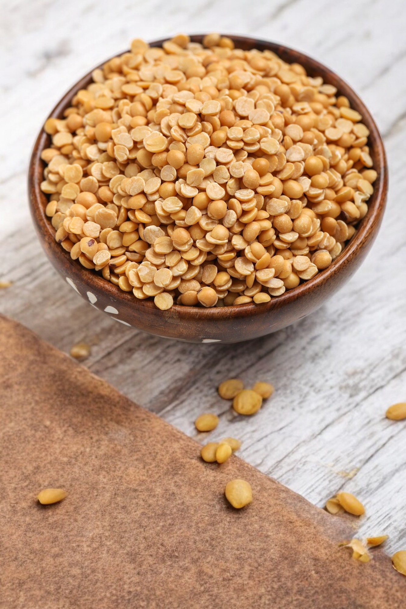A close-up of Toor Dal, also known as Split Yellow Pigeon Pea, rich in protein and perfect for Indian dishes like Sambar and Dal, popular in Ireland.